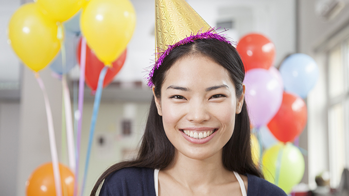 Young Woman At Office Party